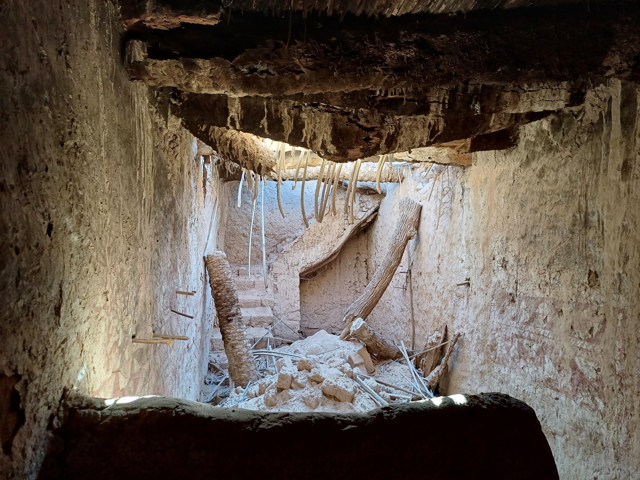 Packed mud houses of AlUla old town below the cliffs